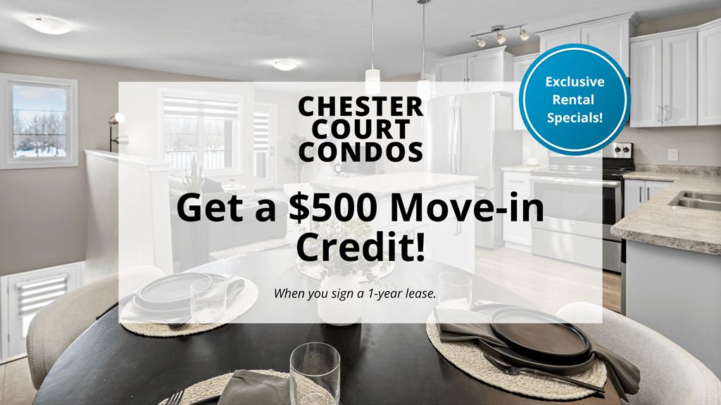 A kitchen interior with a sign offering a $500 move-in credit for Chester Court Condos.