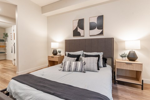 A Bedroom With a Bed at Cadence at Griesbach, Edmonton, AB, T5E 1Y8