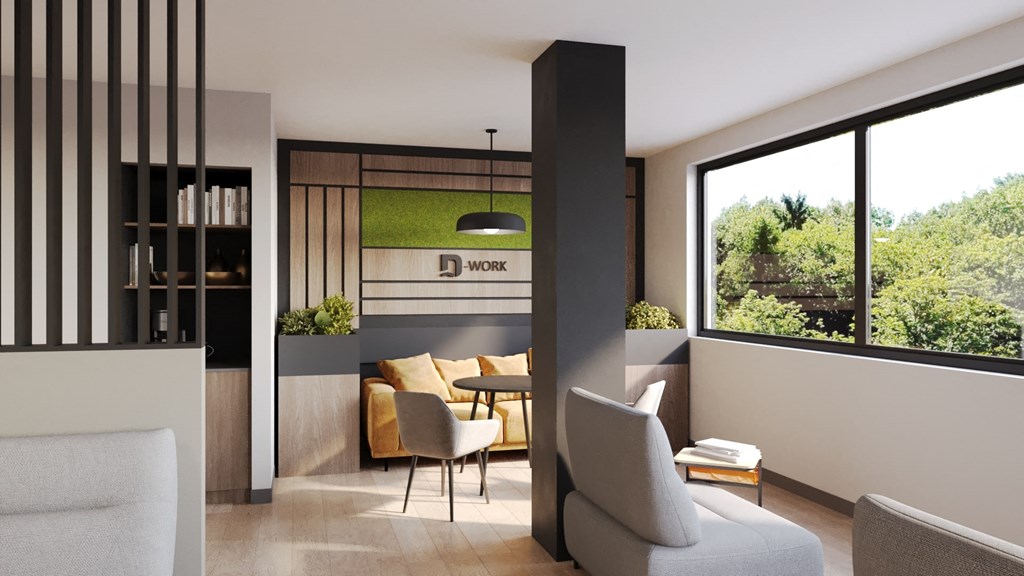 a living room with a couch and a table and a window