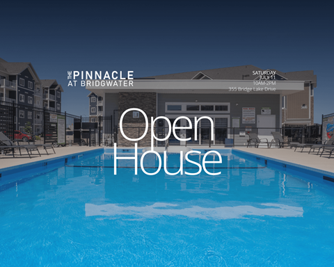 A large pool in front of a building with the words "Open House" written on it.