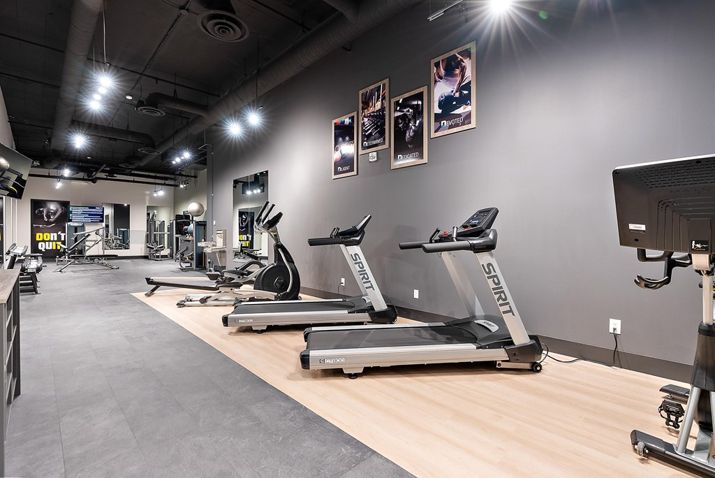 A gym with treadmills and exercise equipment.at Raymond Block, Edmonton