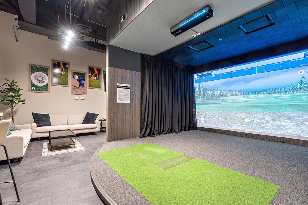 Golf simulator and lounge