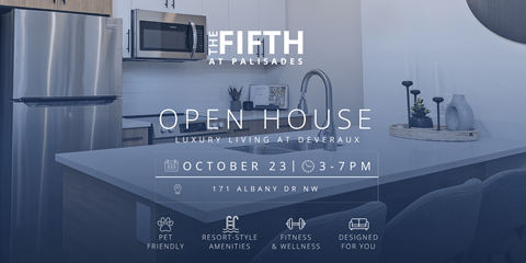 A modern kitchen is showcased in an open house event.