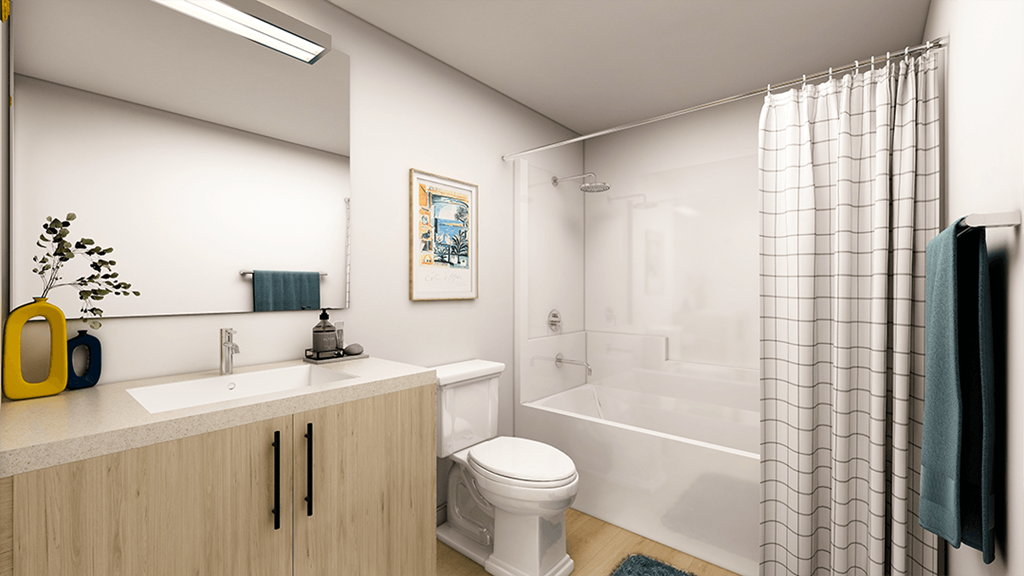 a bathroom with a shower and a sink and a toilet