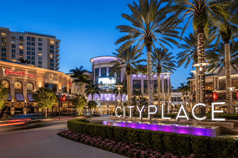 A sign that says Cityplace in front of a building.