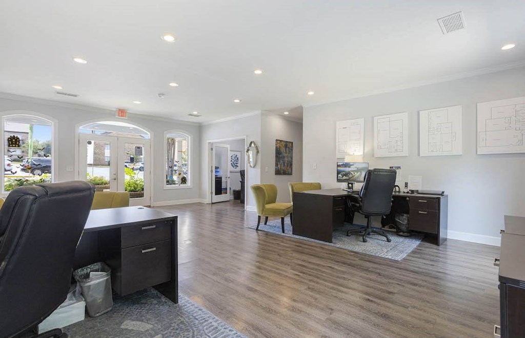 A spacious office with wood floors and white walls. A spacious office with wood floors and white walls at The Onyx Hoover Apartments, Hoover, AL