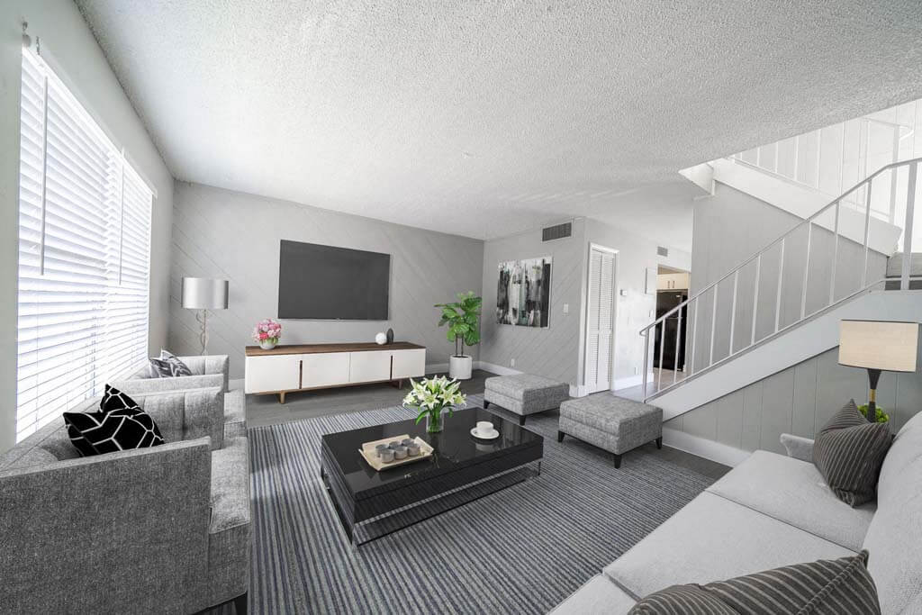 a living room with a couch and a coffee table