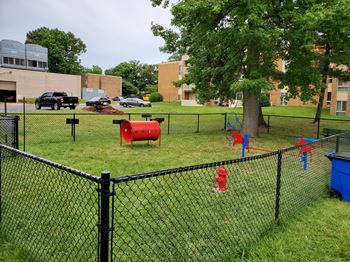 a dog park with grass and attractions at The Glendale Residence Apartments, Lanham, MD