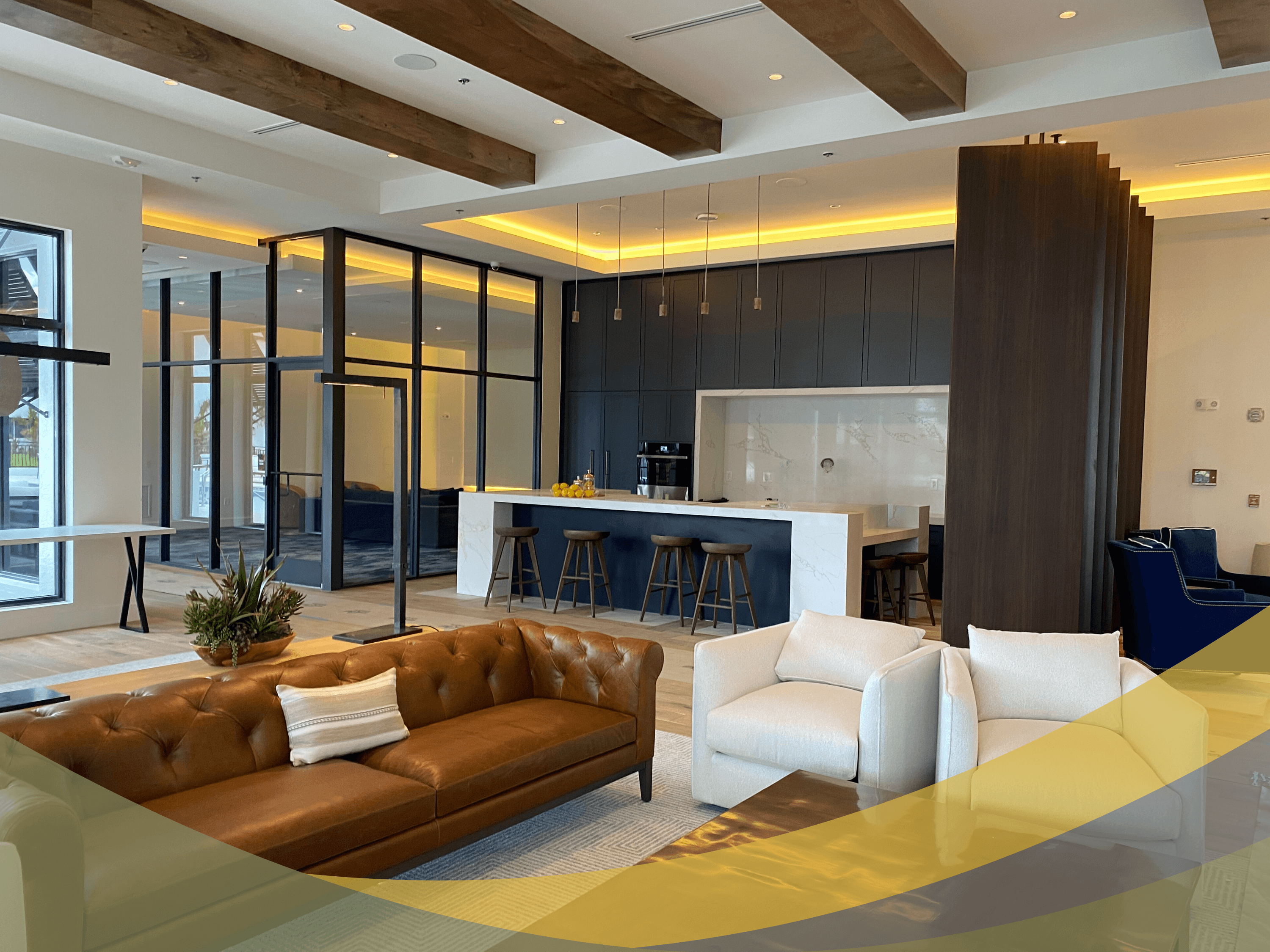 A modern living room with a brown leather couch and a white sofa.