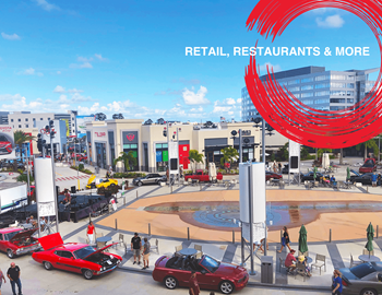 a rendering of retail restaurants and more at the mgm grand with cars parked outside