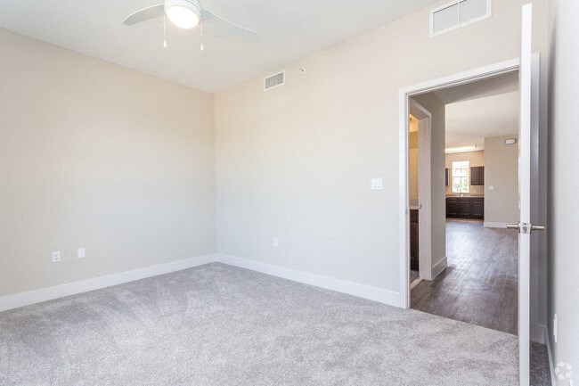 Carpeted Bedroom at Playa Apartments, Florida