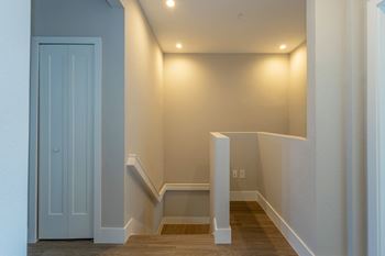 A white door is on the left side of the image.