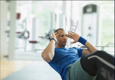 a man exercising in a gym at The Orchard at Portofino Vineyards, Fort Myers, FL 32149