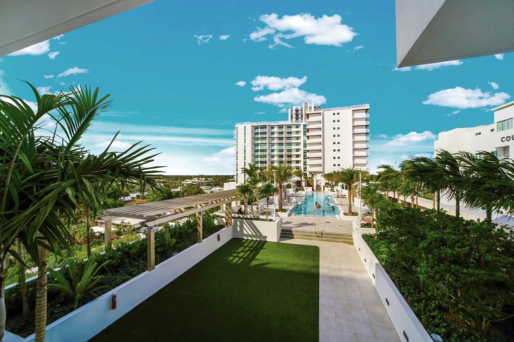 The Bridge pool deck and North Tower at Quantum Apartments