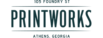 A poster with the text "PRINTWORKS" in large letters.