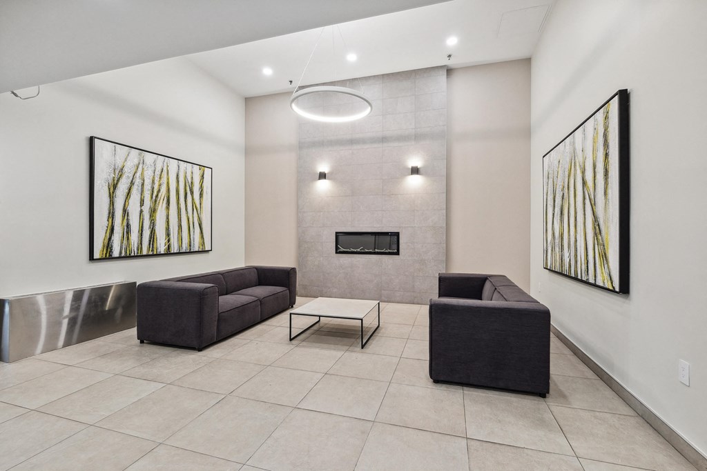 a living room with two couches and a coffee table