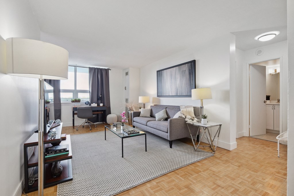 a living room with a couch and a table