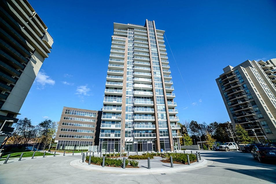 a view of an apartment building from the street