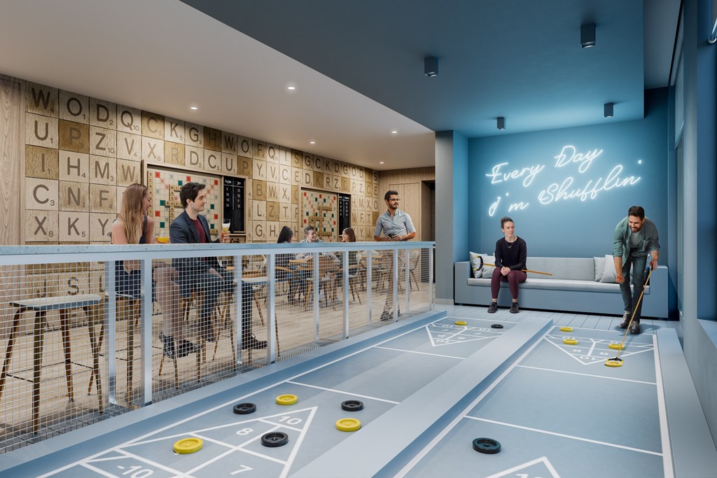 a room with a ping pong table and people in a lobby