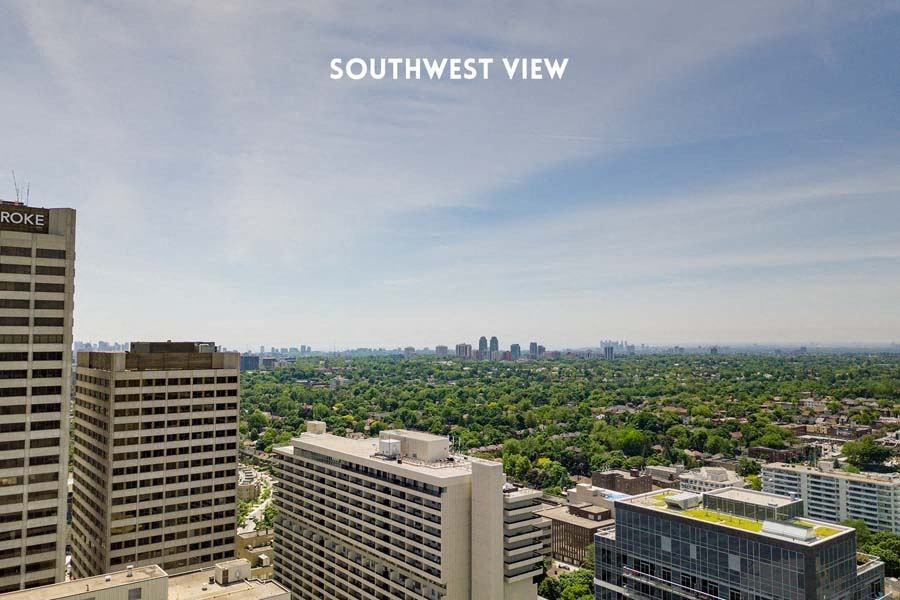 the view of the city from the top of a building