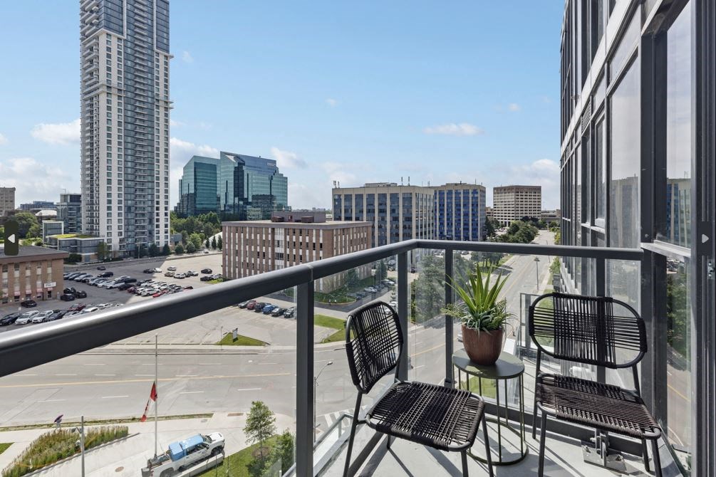 a balcony or terrace with a view of the city