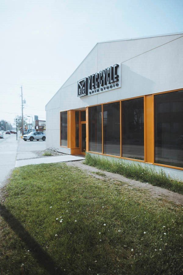 a white building with a sign on the side of it