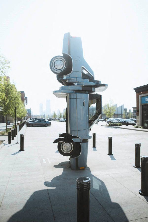 a parking meter on the side of a parking lot