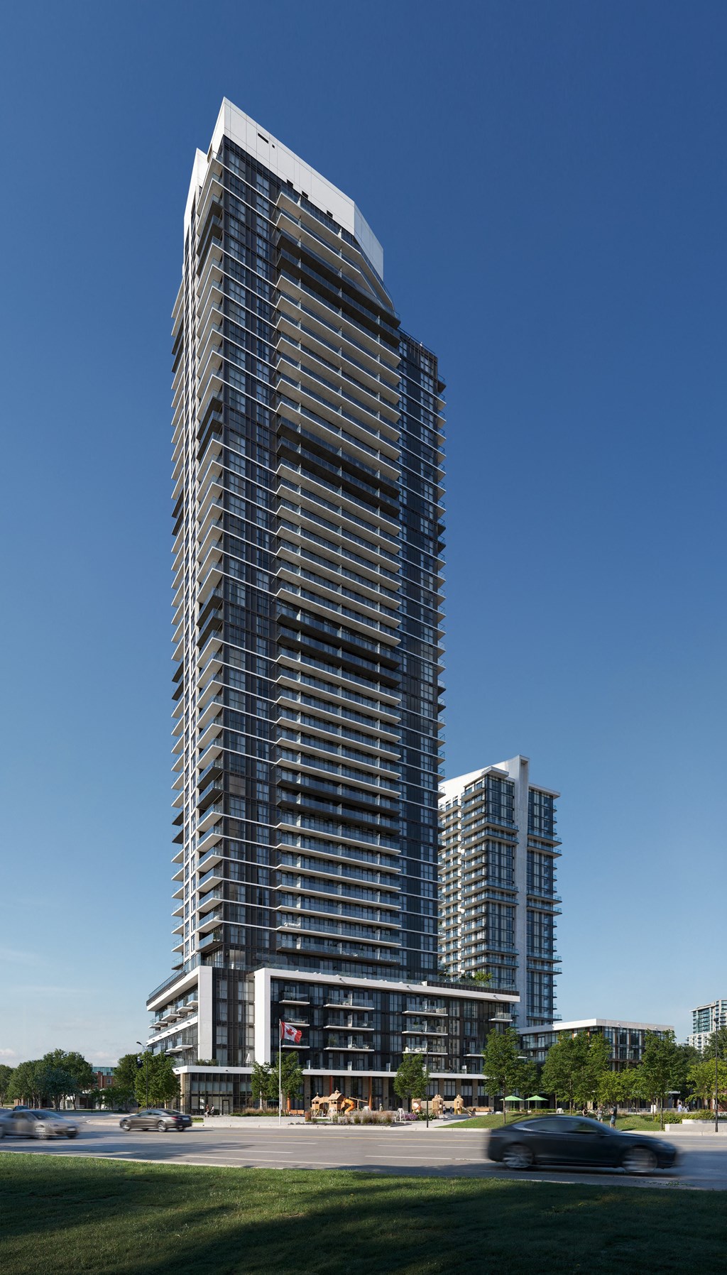 a tall skyscraper with a blue sky background and a street