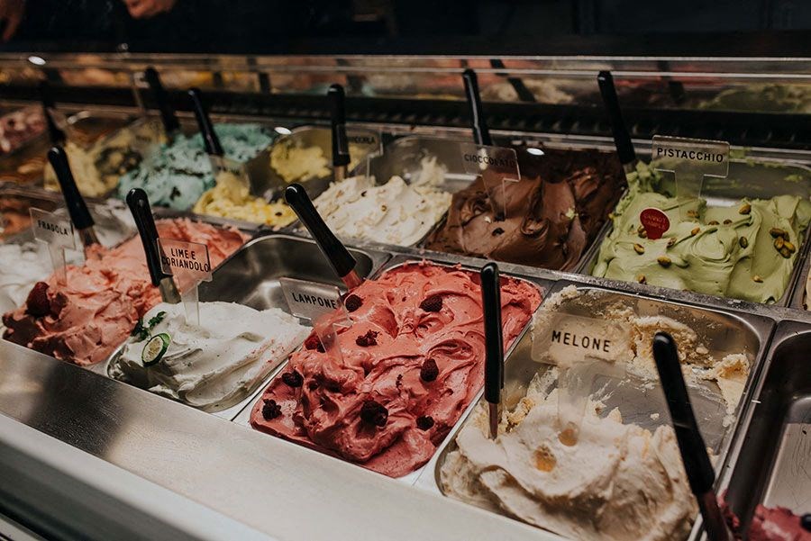 a display case filled with different types of ice cream