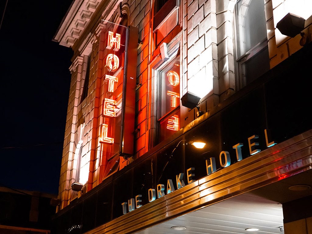 the facade of the ocean hotel lit up at night