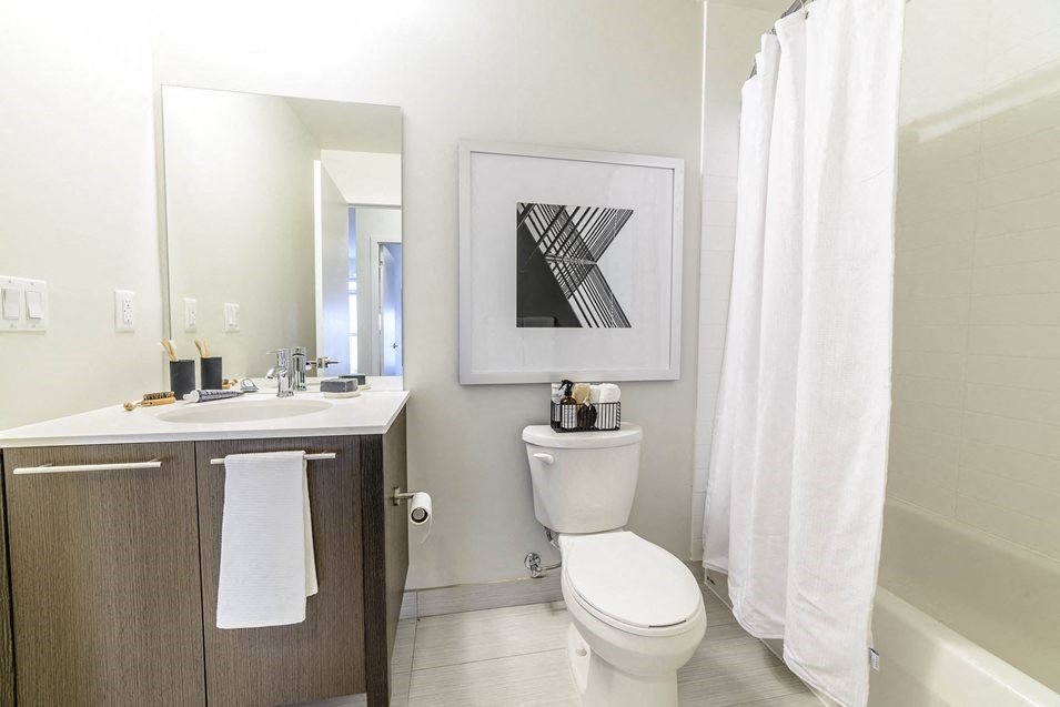 a bathroom with a toilet and a sink