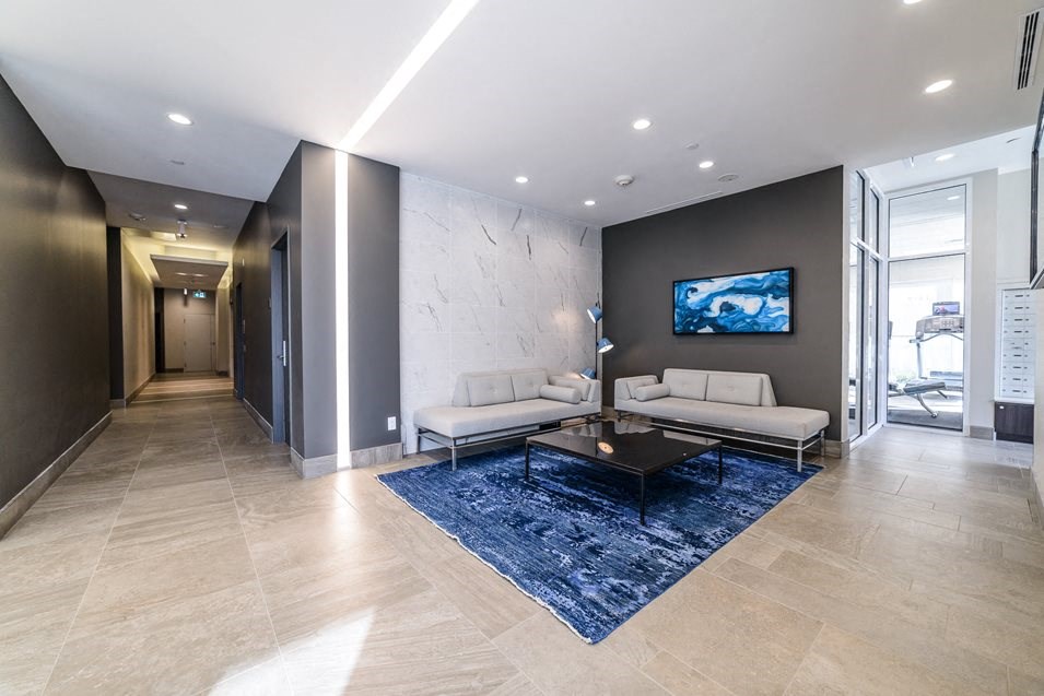 a living room with a couch and a table