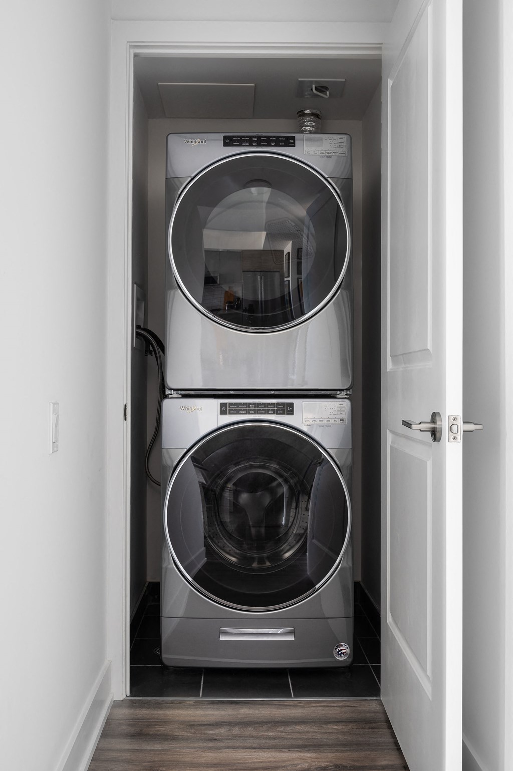 a small laundry room with a washer and dryer