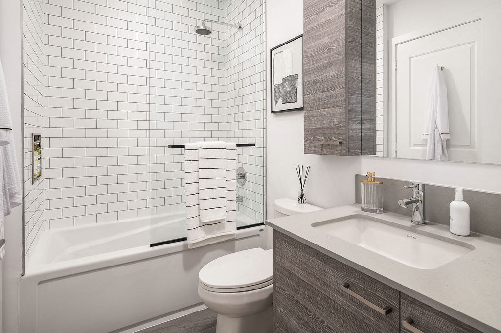 bathroom with full bath and shower