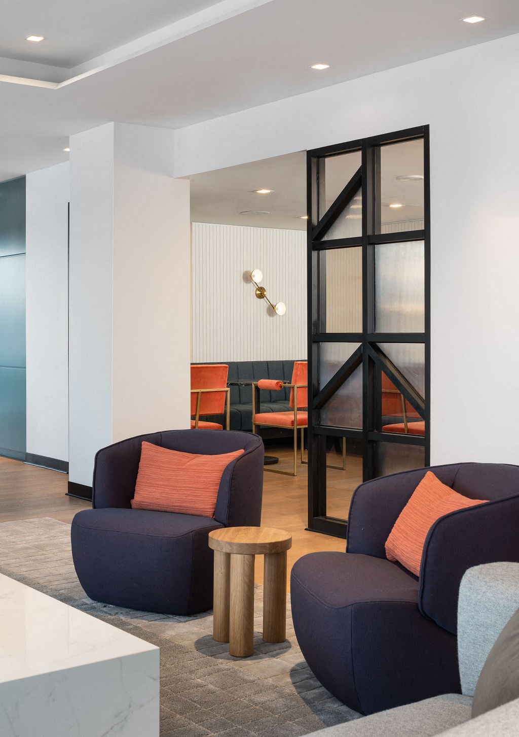 a living room with couches and a table