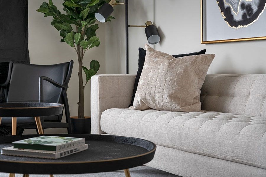 a living room with a couch and a coffee table
