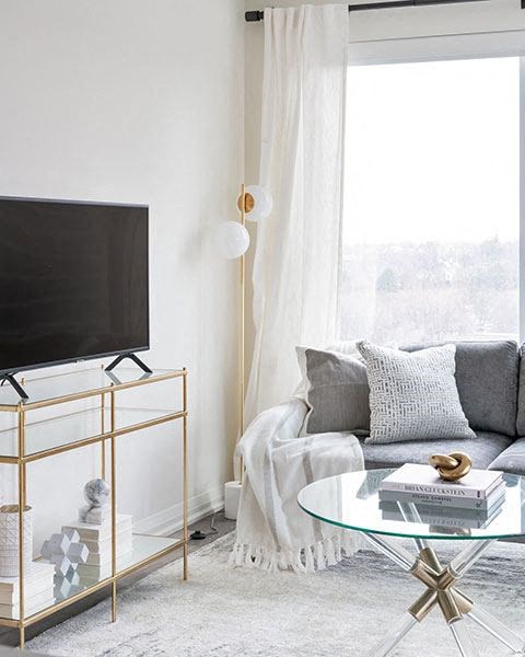 a living room with a couch and a television