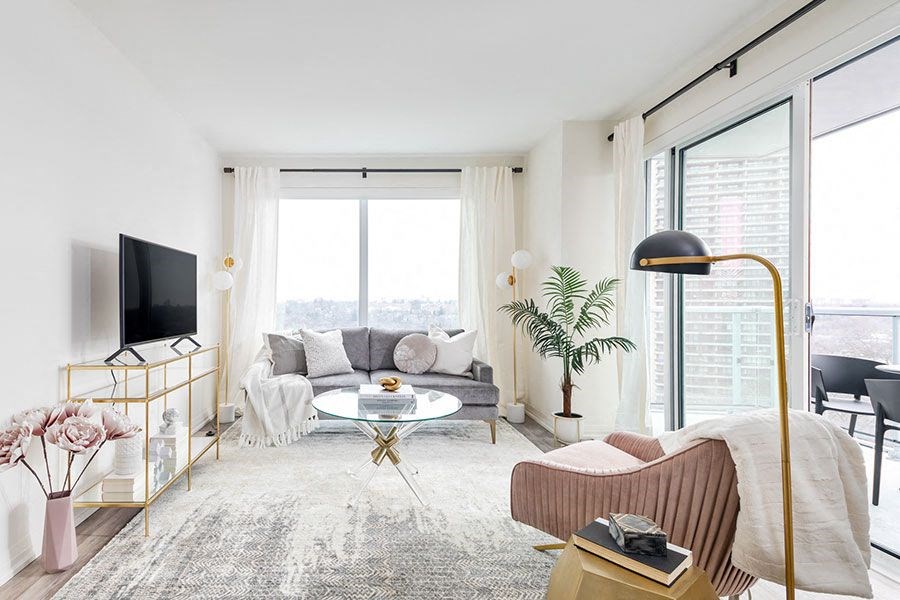 a living room with a couch and a tv