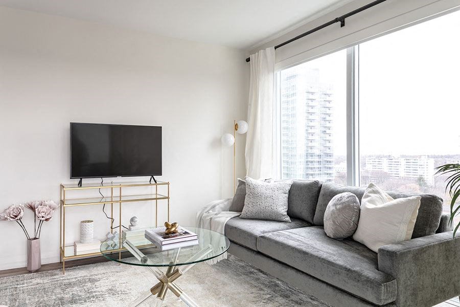 a living room with a couch and a television