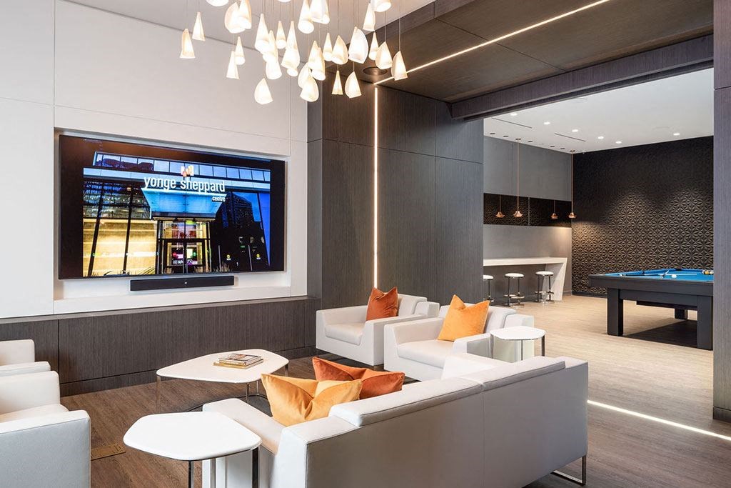 a living room with couches and a television