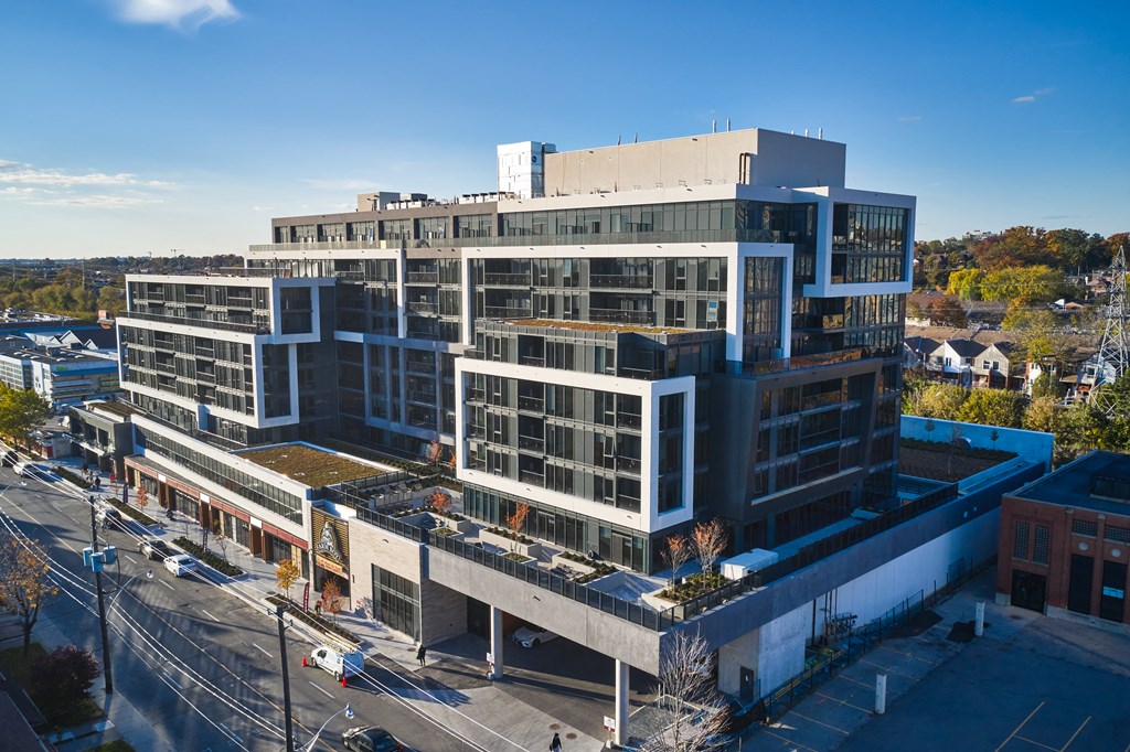 an aerial view of an office building and a city street