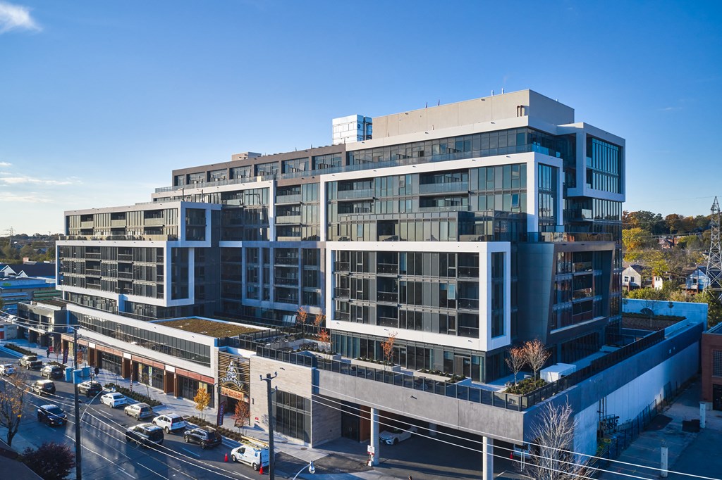 an aerial view of an office building on a city street