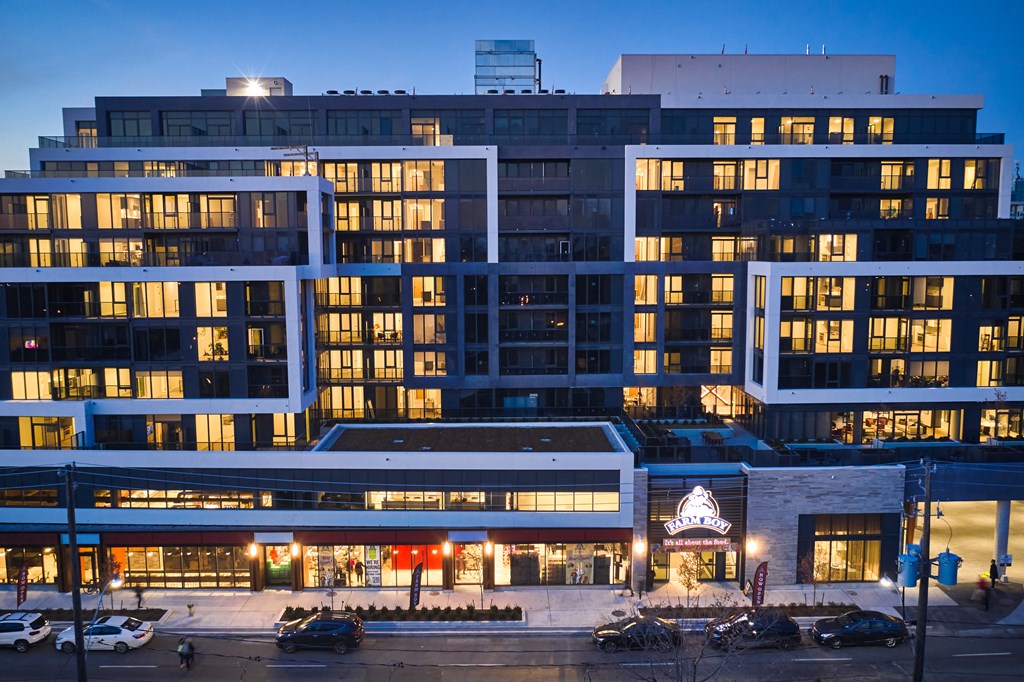 the building where the hotel is located is lit up at night