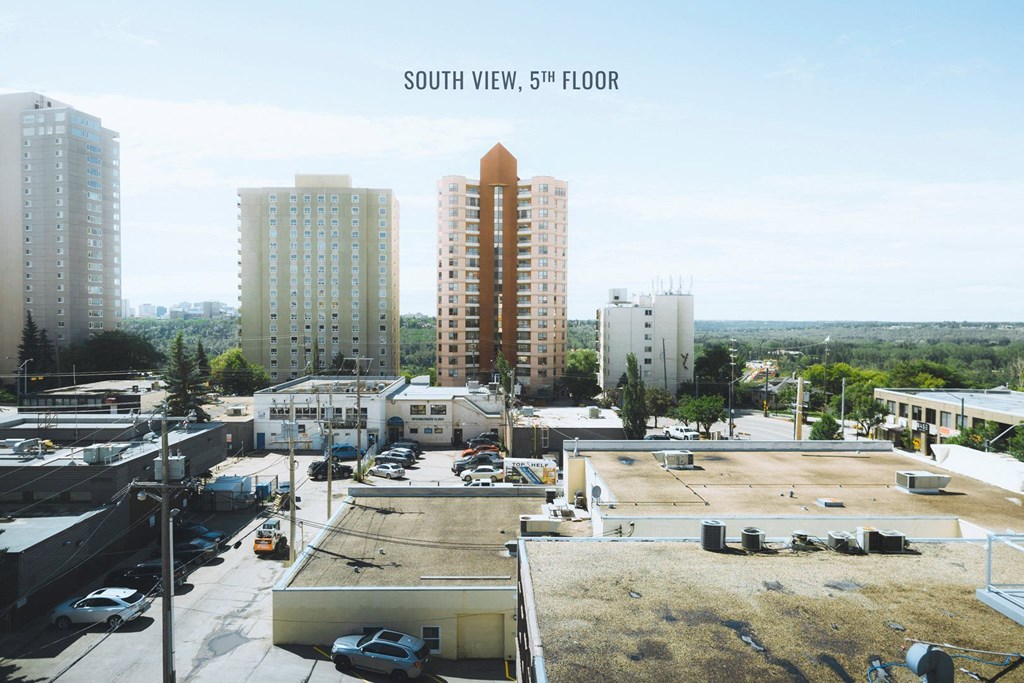 a view of the city from the roof of a building