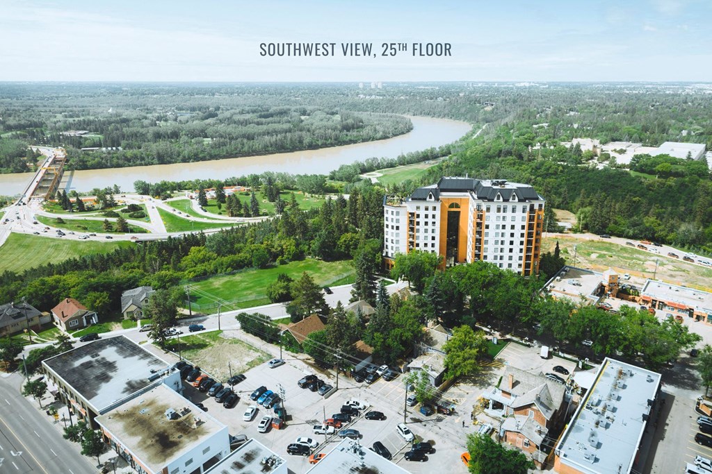 an aerial view of a city with a river