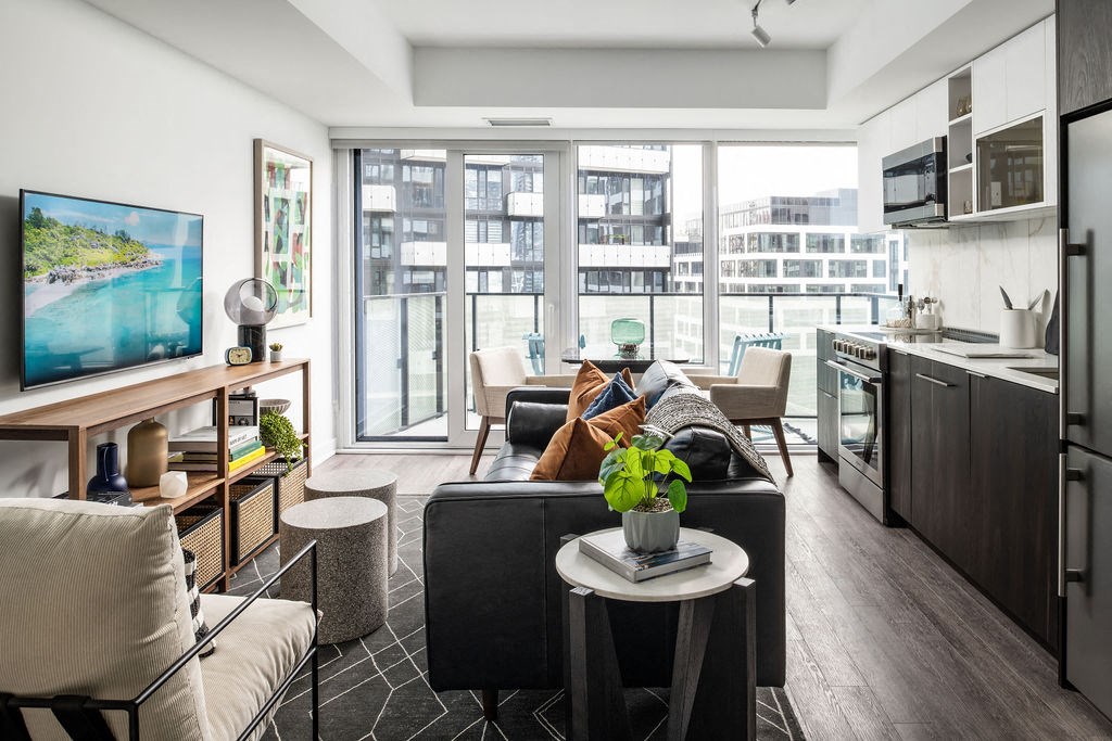 a living room with a couch and a tv