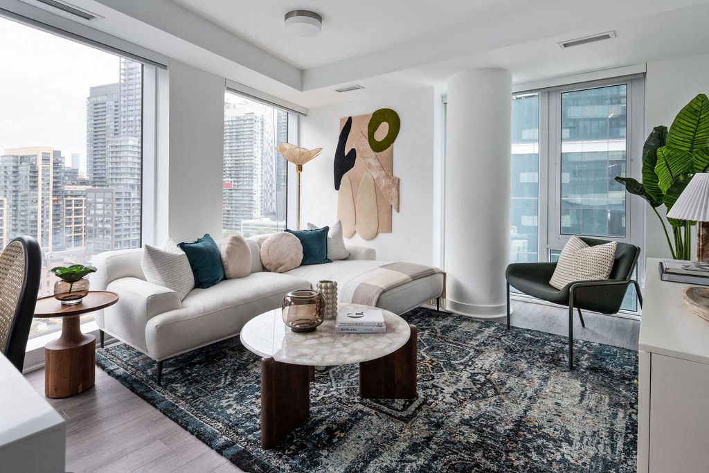 a group of people standing in a room with lines of people touching each other