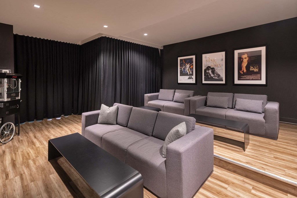 a living room with couches and a coffee table