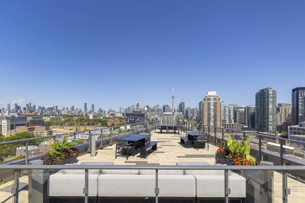 a view of the city from a roof top terrace