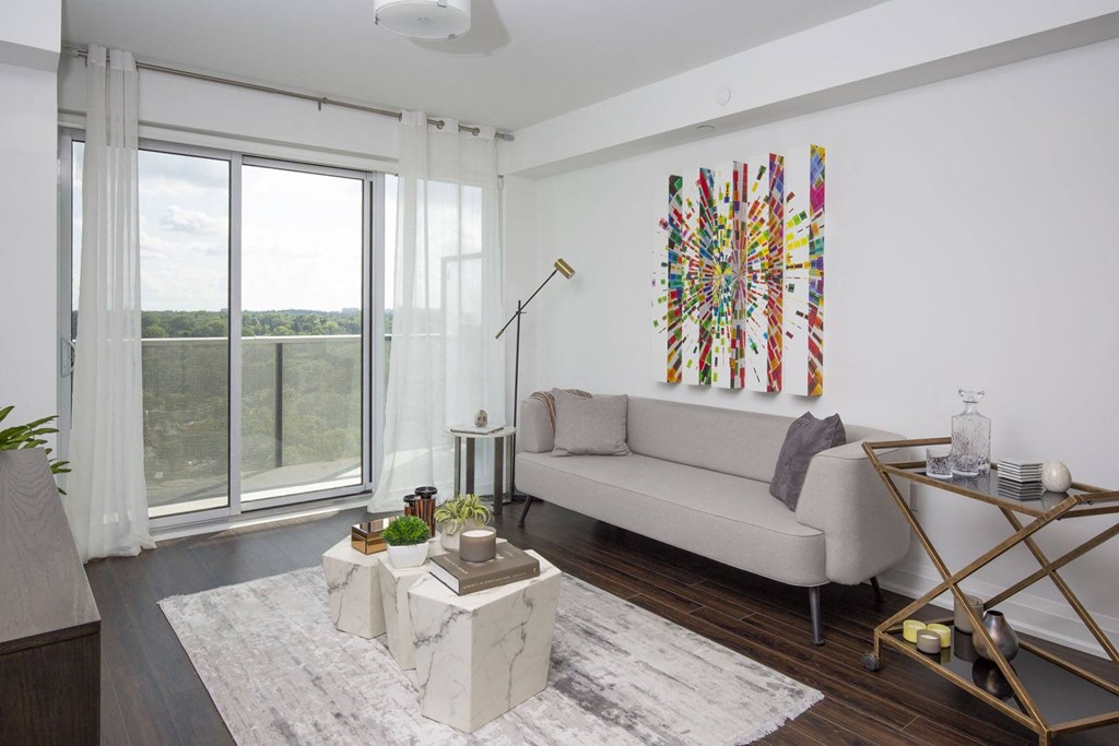 a living room with a couch and a table